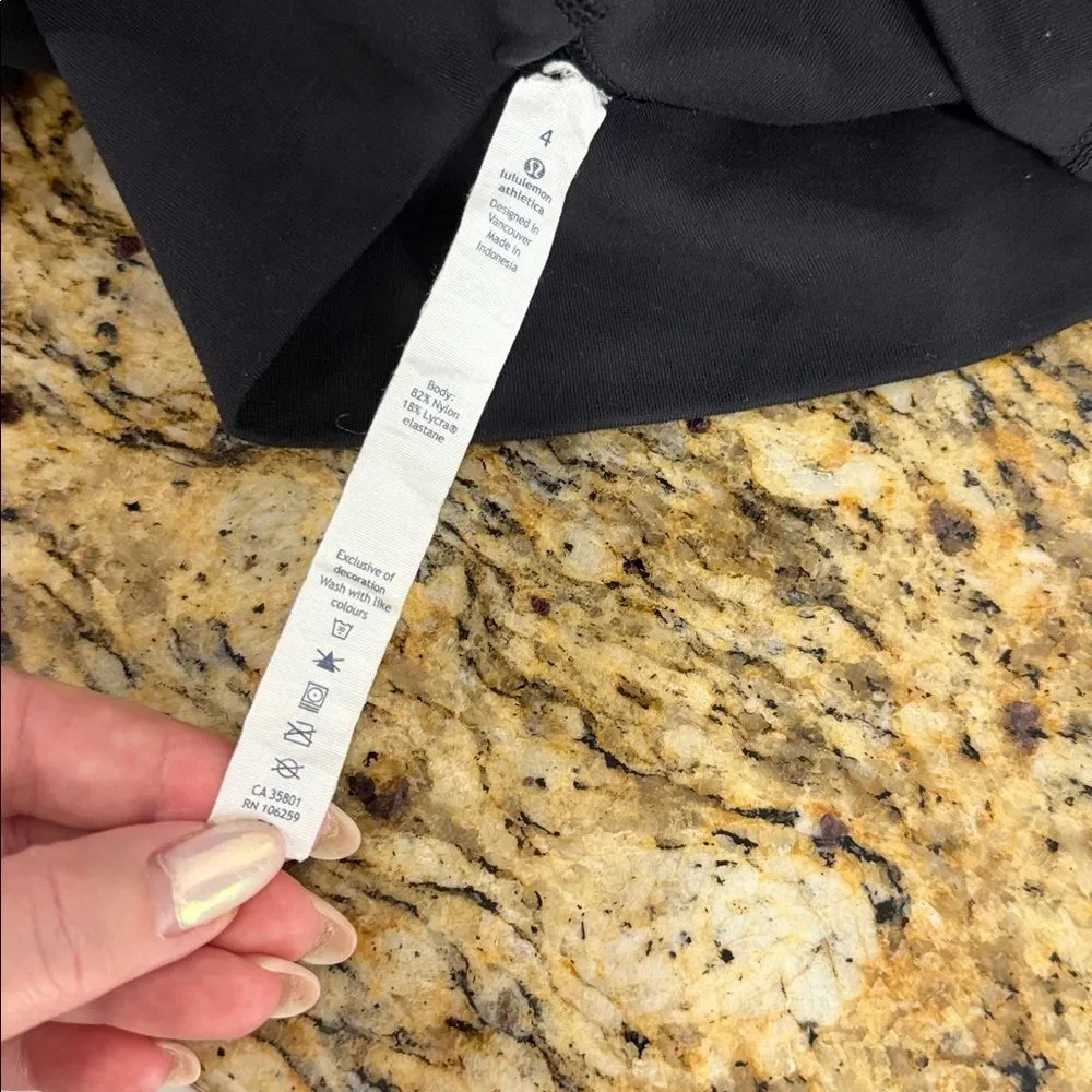 Lululemon Black Cropped Leggings Size 4 Laser Cut Hem Yoga Pants